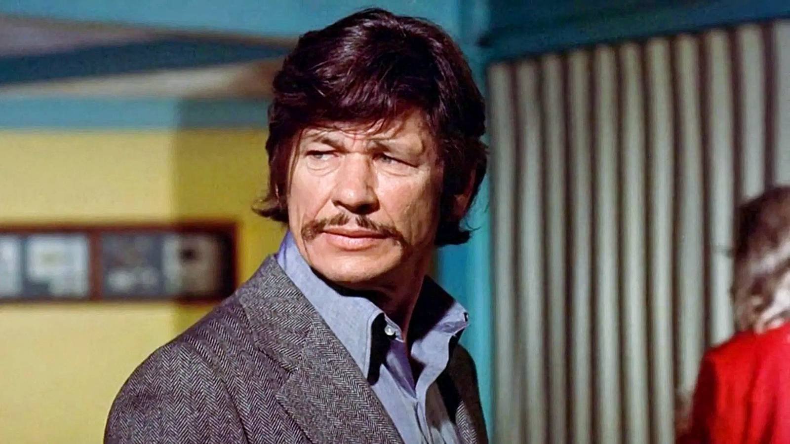 Charles Bronson looking worried as Bishop in The Mechanic.