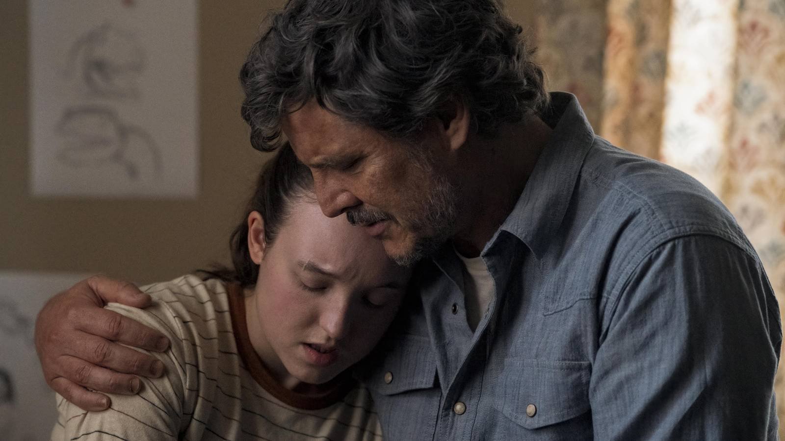 Joel embracing Ellie in The Last of Us