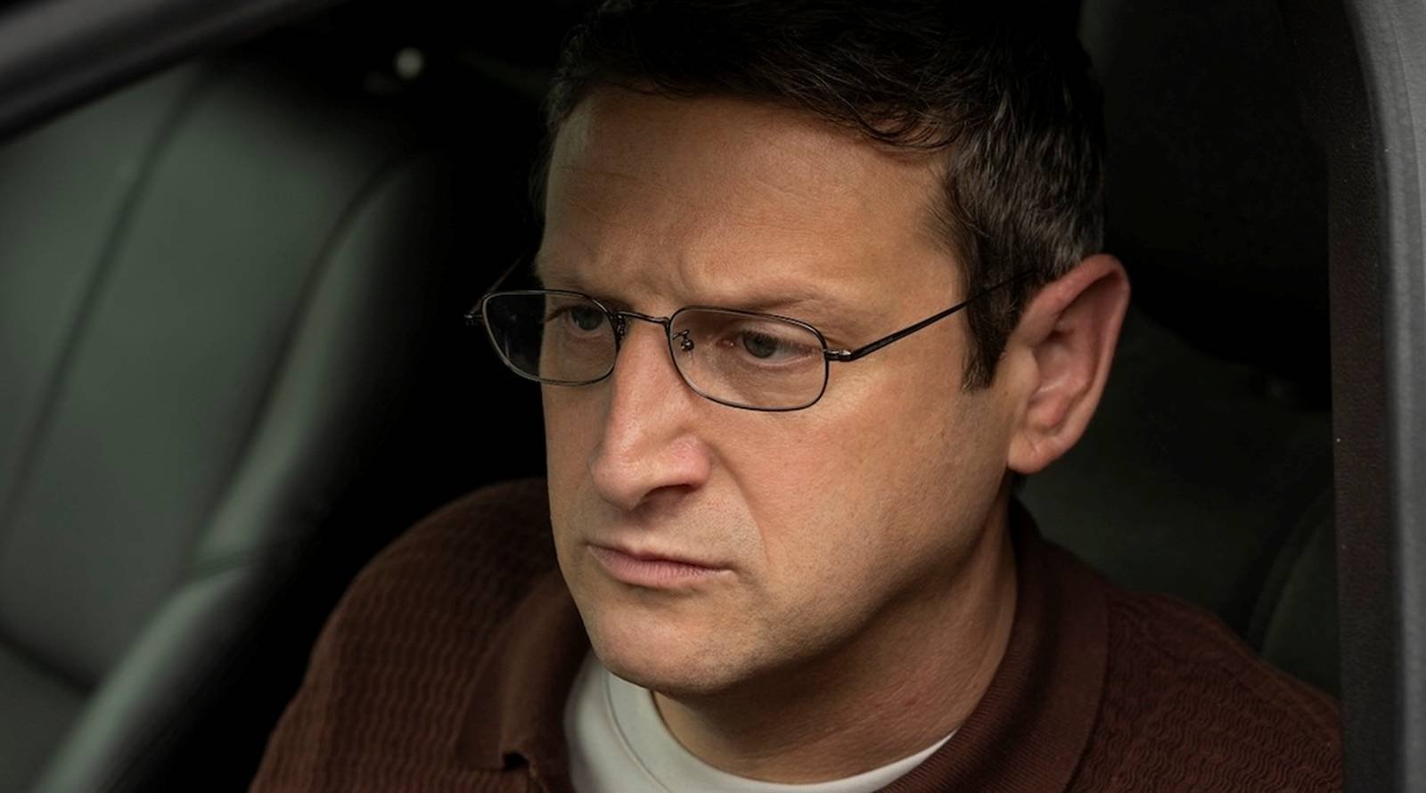 Ron sitting in his car in The Chair Company