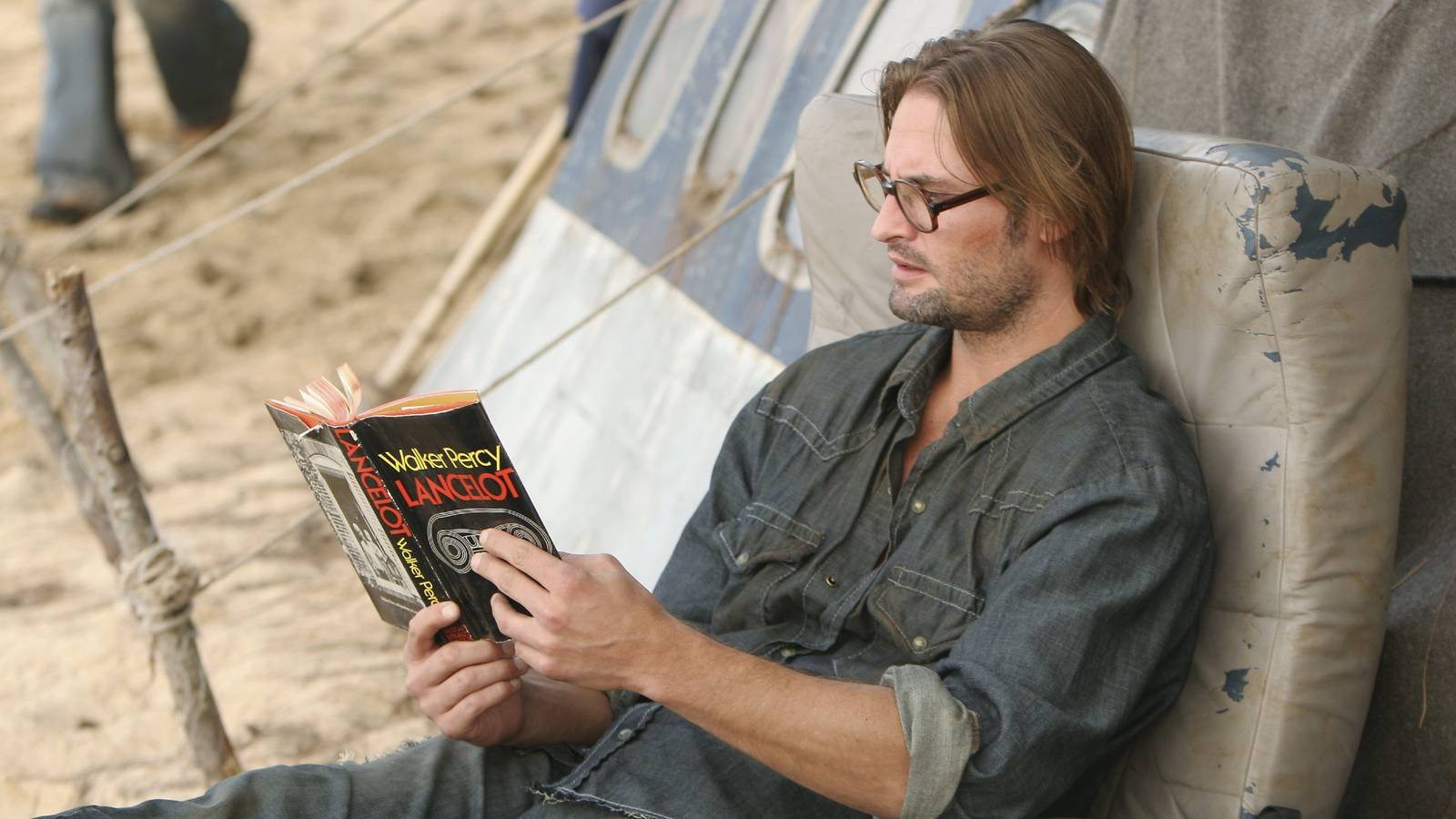 Sawyer Reading a Book in Lost