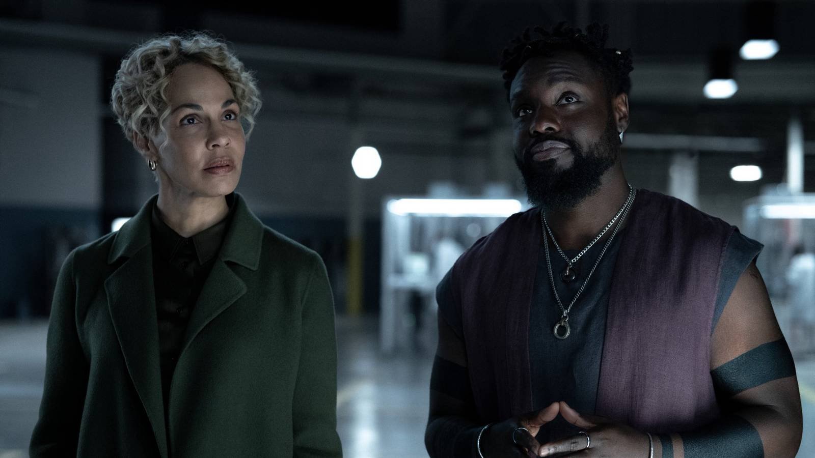 Leighton and Blair from Dark Matter looking at each other