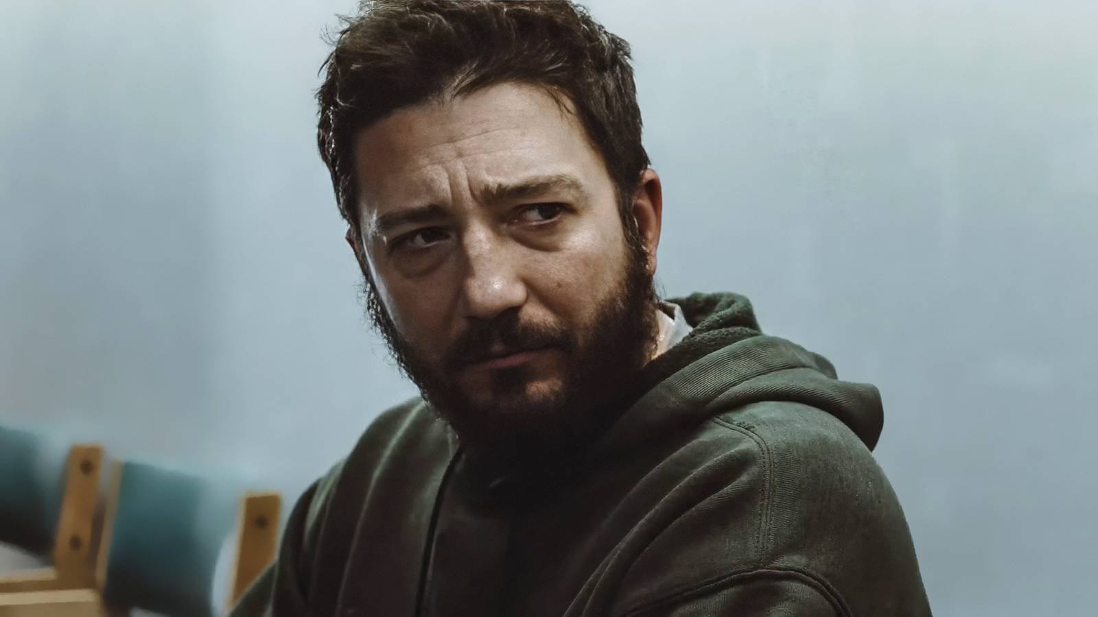 John Magaro looking deeply sad in Omaha