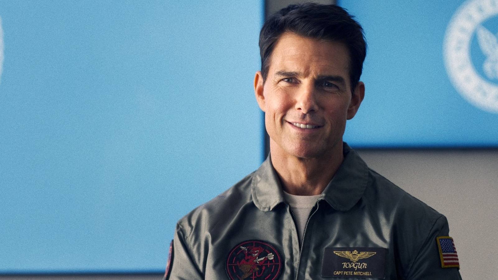 Tom Cruise as Maverick smiling in Top Gun: Maverick.