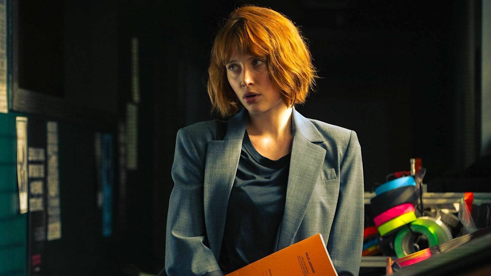 A woman with an orange bob in Netflix's Under a Dark Sun.