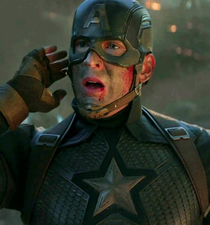 Chris Evans' Captain America getting a call with his arm flexed in Avengers: Endgame